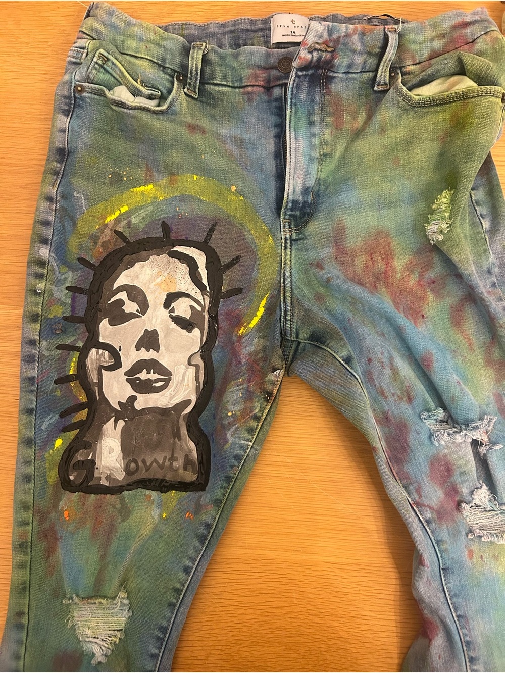 Hand-Painted Green Tie-Dye Jeans with Artistic Graphic